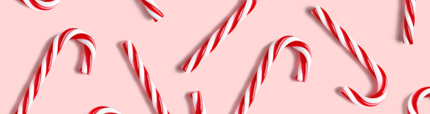 Candy cane for party design on pink background.