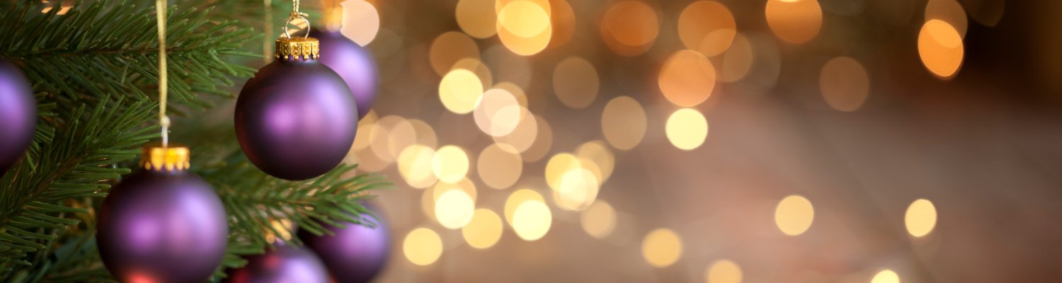 Christmas Tree with Purple Baubles and Gold Lights Background
